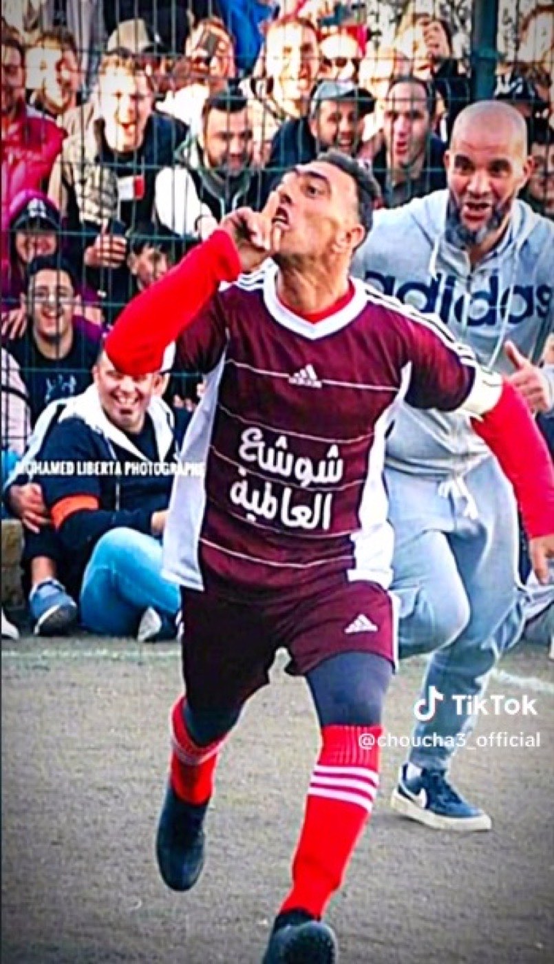 Choucha celebrating in a maroon kit