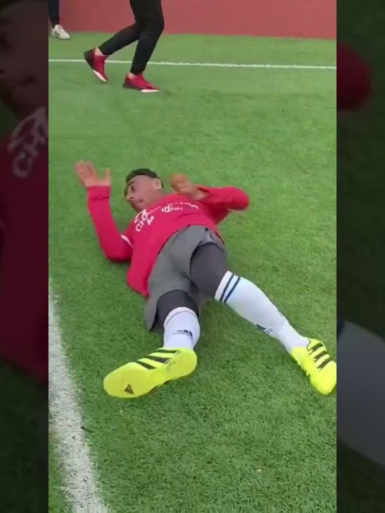 Choucha lying on the pitch celebrating