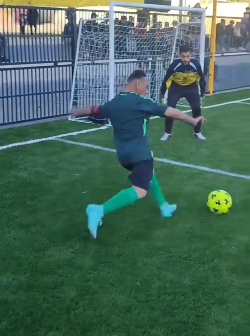 Choucha striking the ball past a keeper