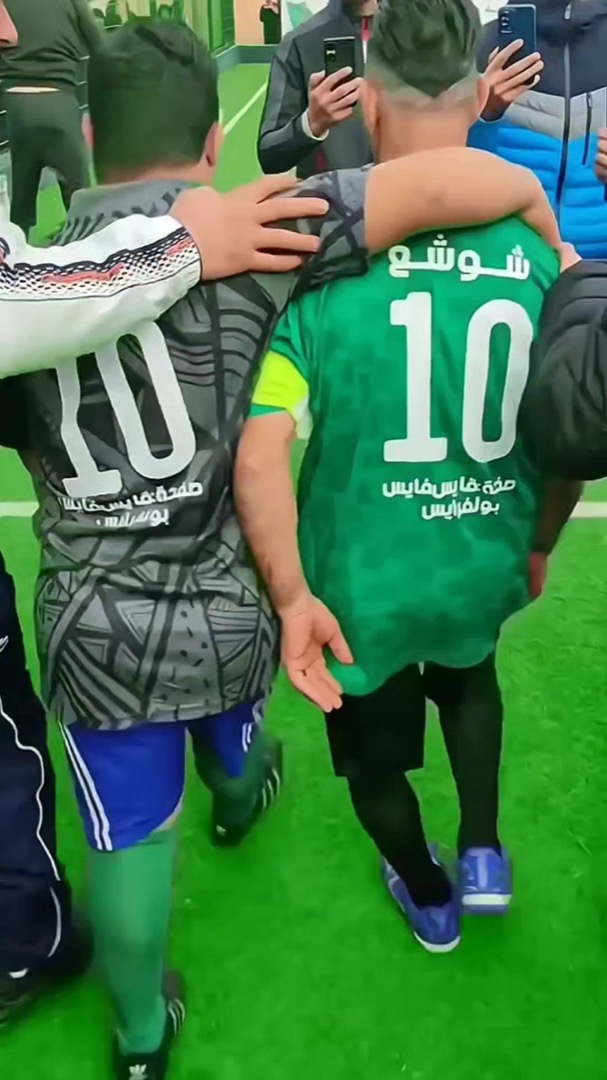 Choucha in a green number 10 shirt